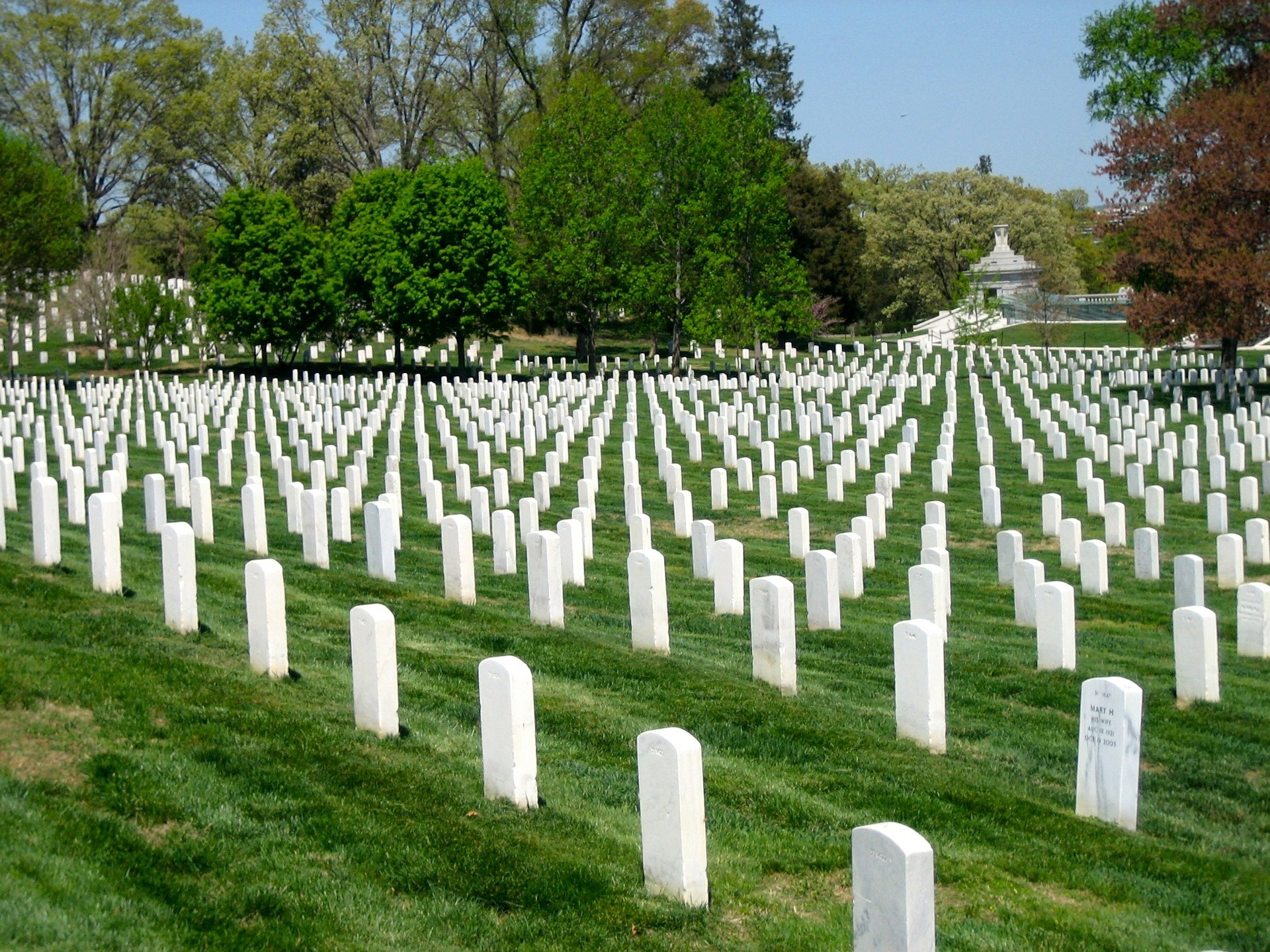 Rows of white headstones at Arlington National Cemetery