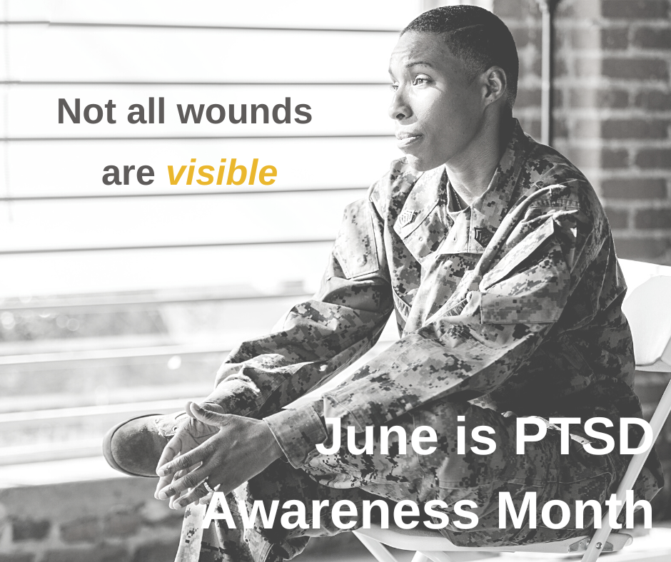 Serviceperson looking out a window with the words "Not all wounds are visible. June is PTSD Awareness Month".